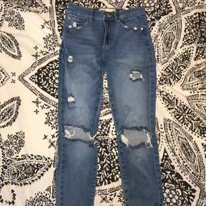 Ripped blue skinny jeans